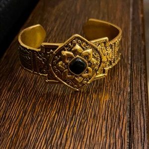 Gold cuff with black accent